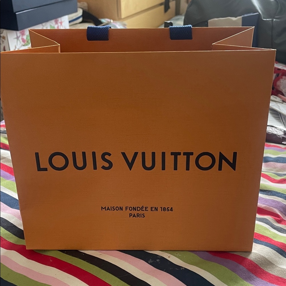Louis Vuitton Bold Orange Bag with Black Lettering